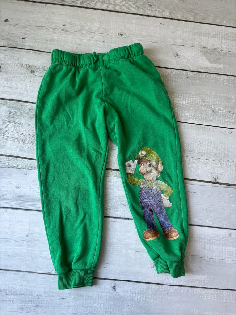 5/$25 H&M Green Luigi Graphic Sweatpants for Kids - Super Mario